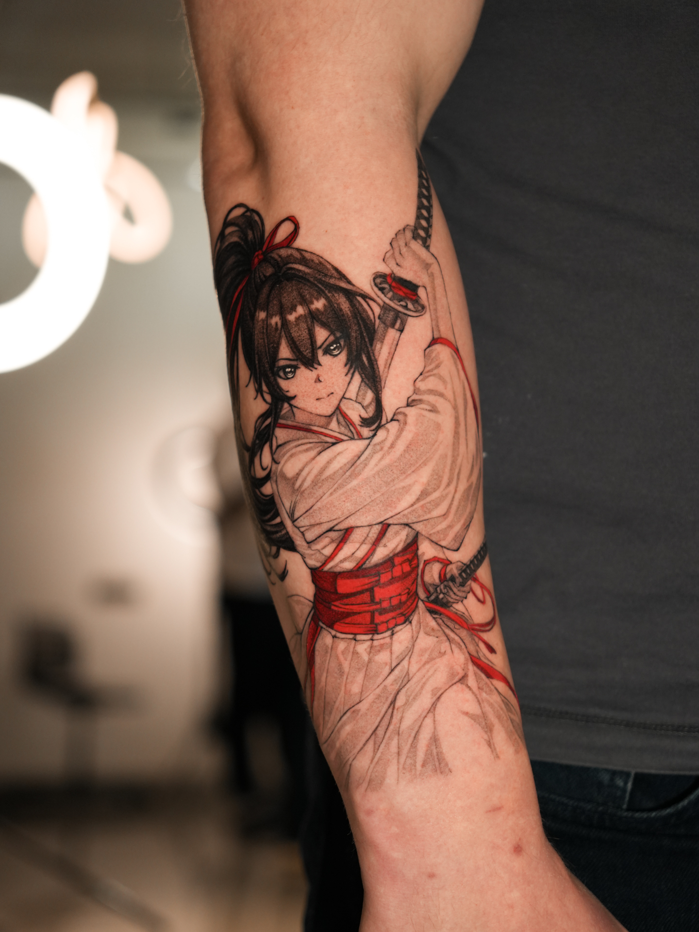 Graphic anime character tattoo