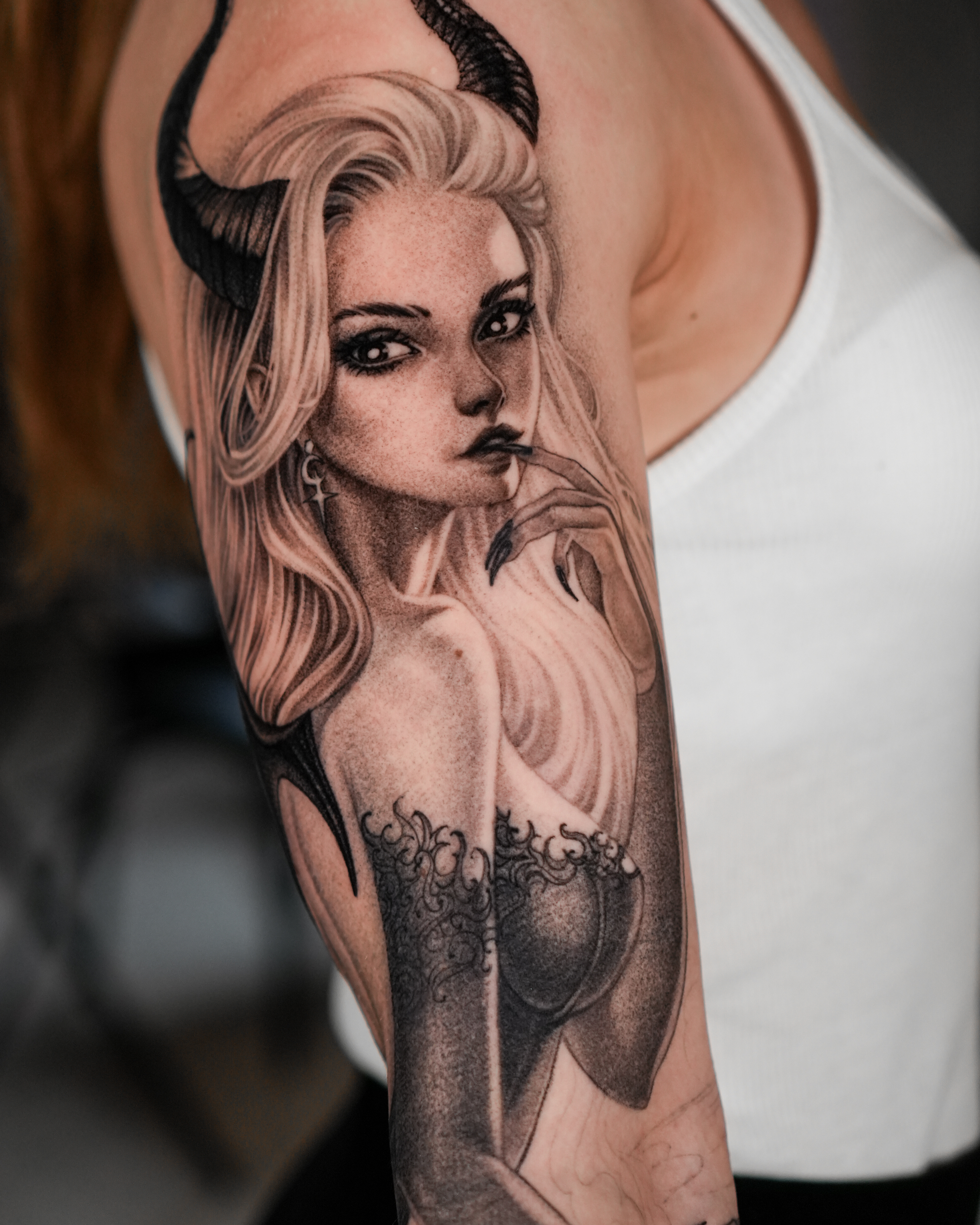 Realism succubus portrait tattoo