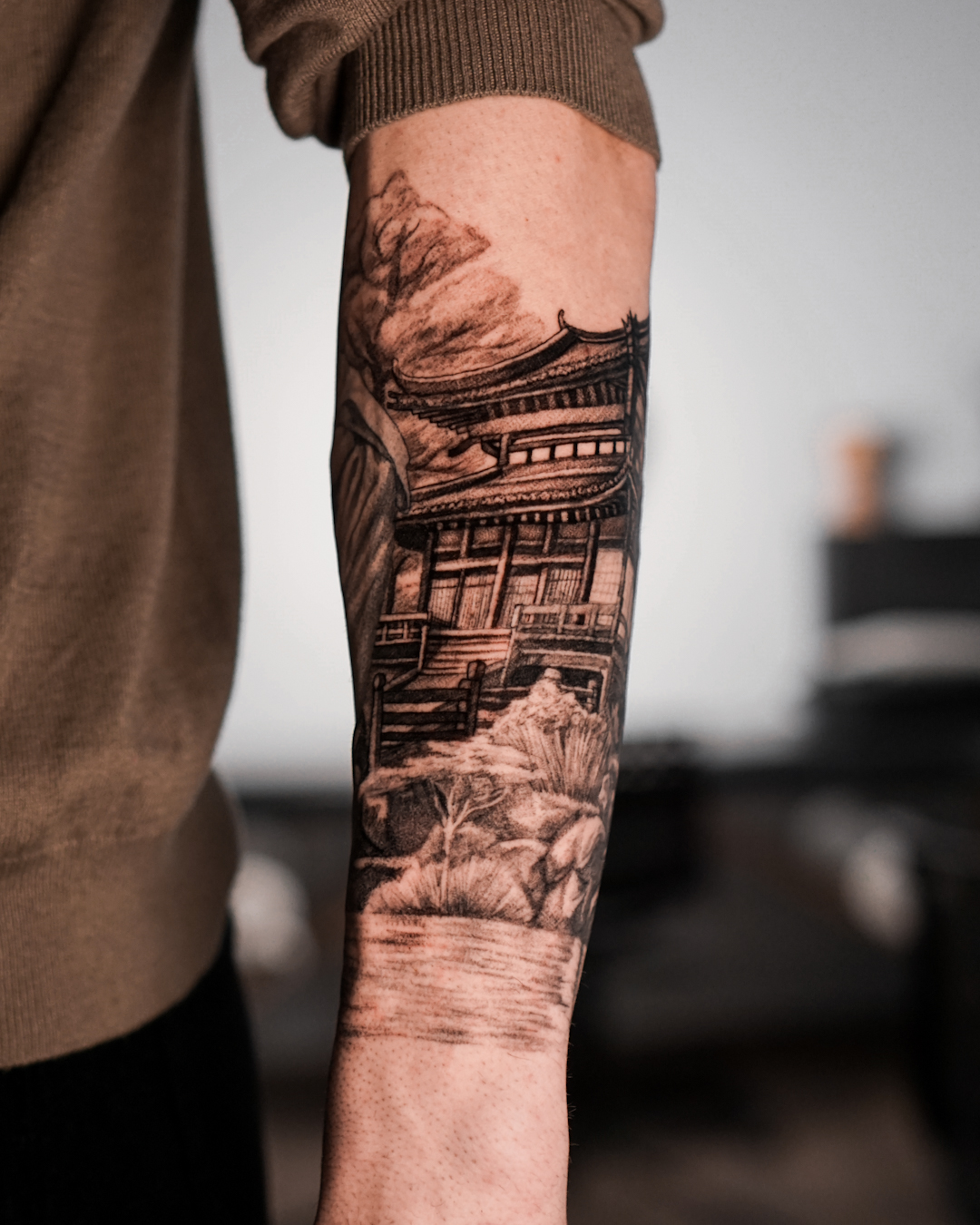 Japanese temple forearm tattoo